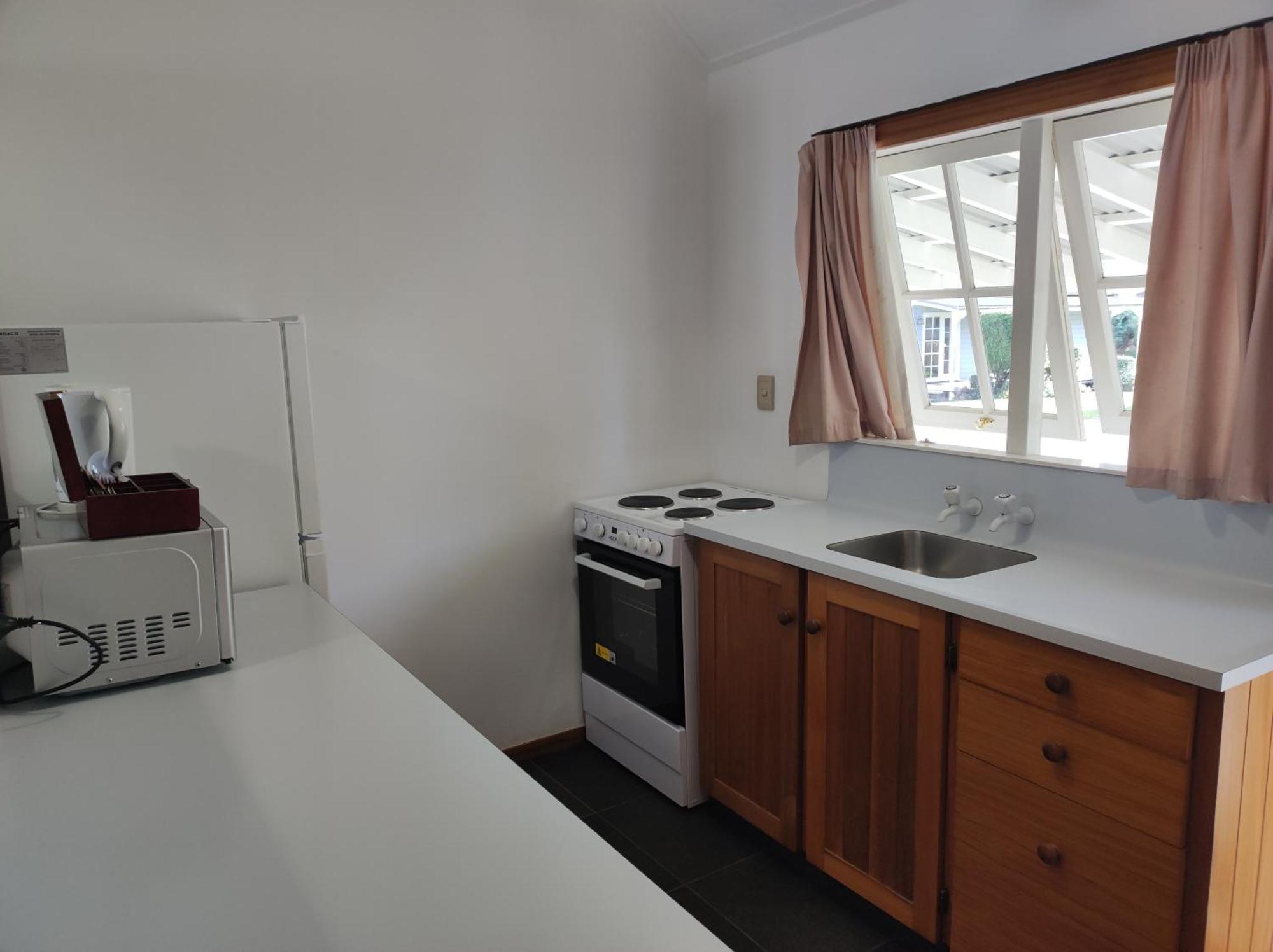 Huka Falls Resort Lago Lago Taupo Exterior foto A kitchen in a student flat